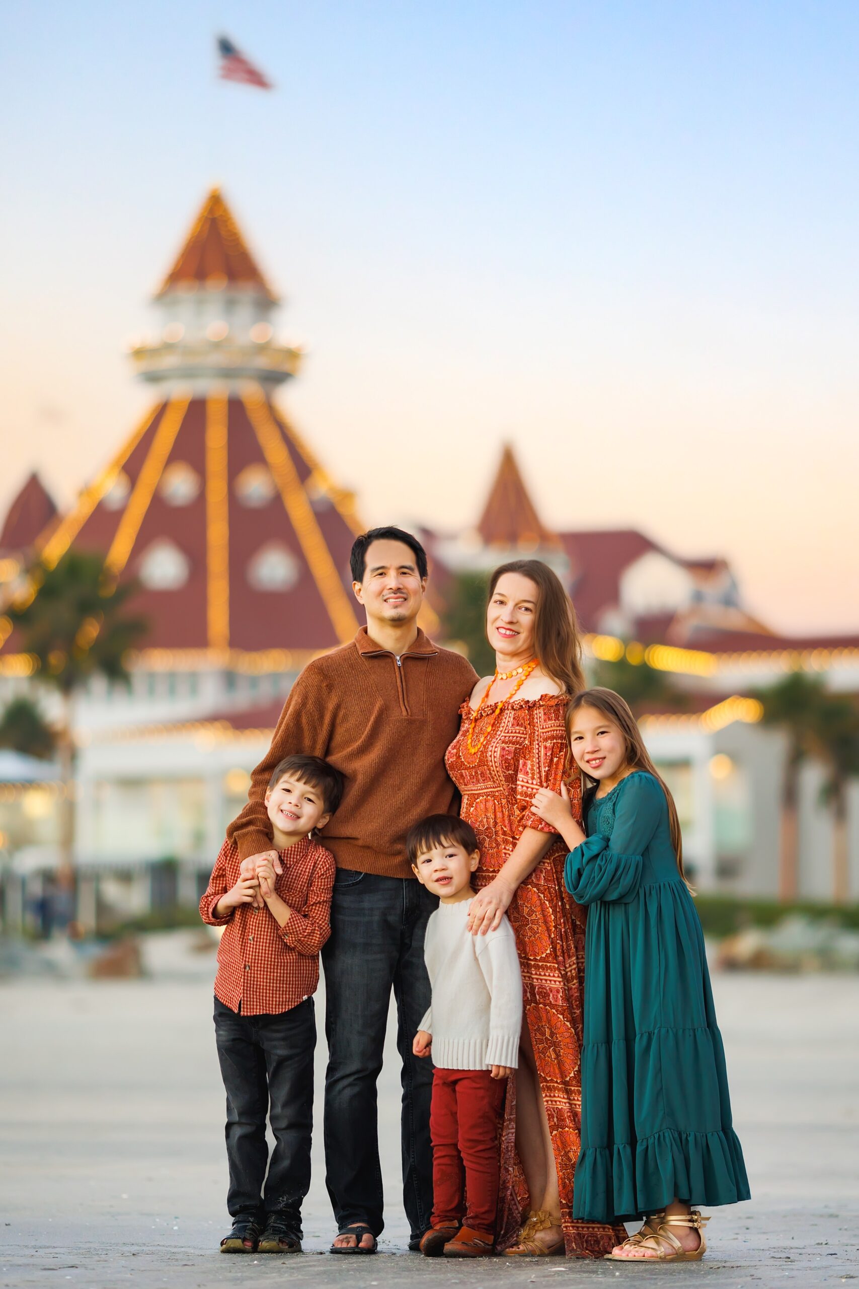 Family posing in front of Hotel Del Coronado