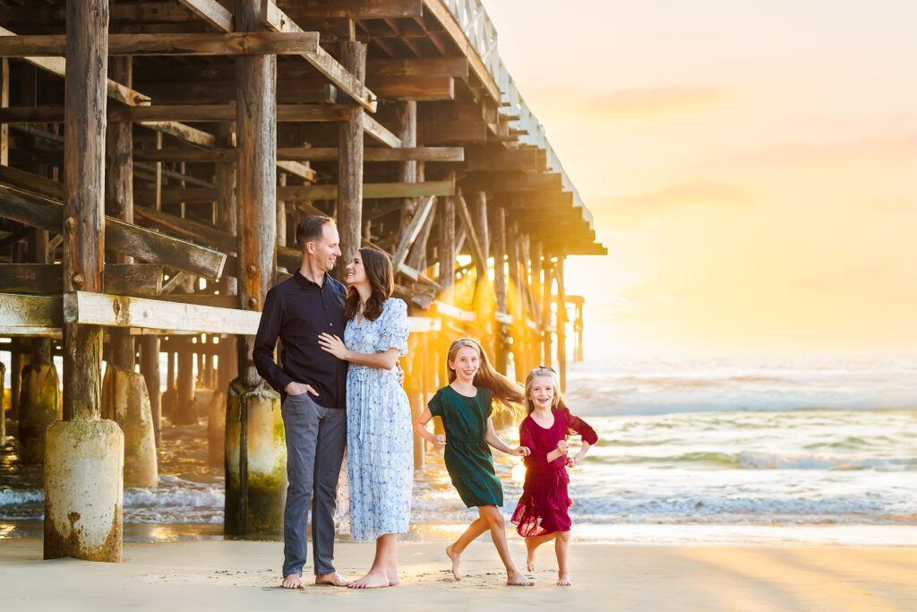 Family portrait session under Crystal Pier in San Diego