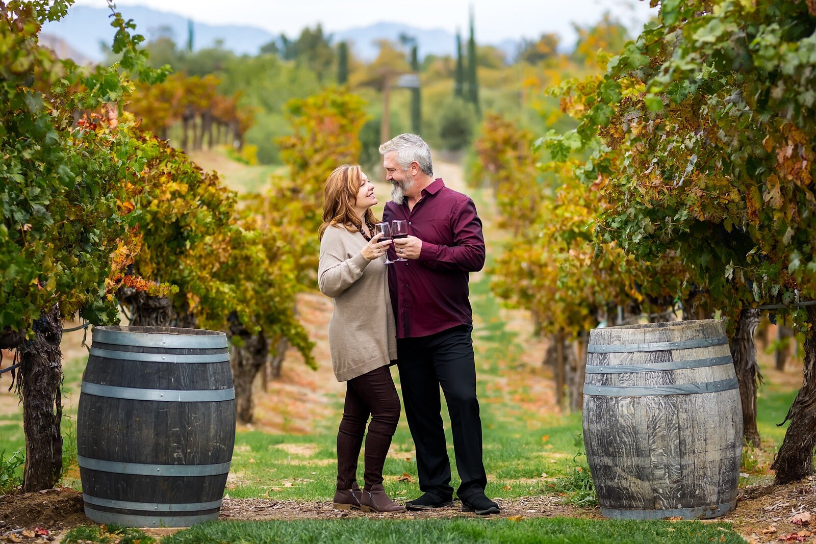Couple sipping wine together at a winery in Temecula.